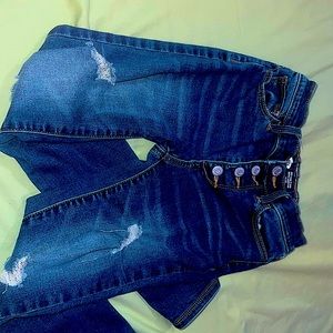 Skinny legged ripped jeans